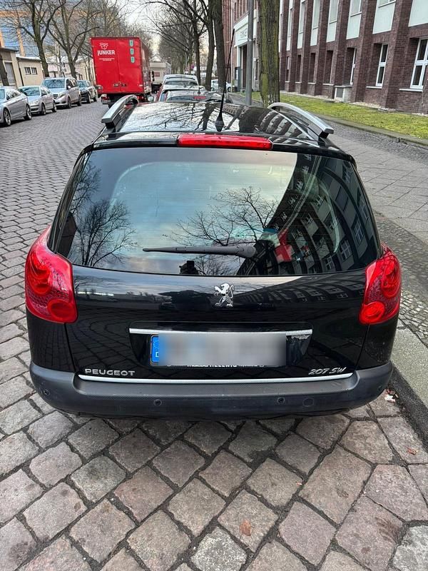 Gebraucht Peugeot 207 95 PS (69 kW) 2011 Schwarz Kombi