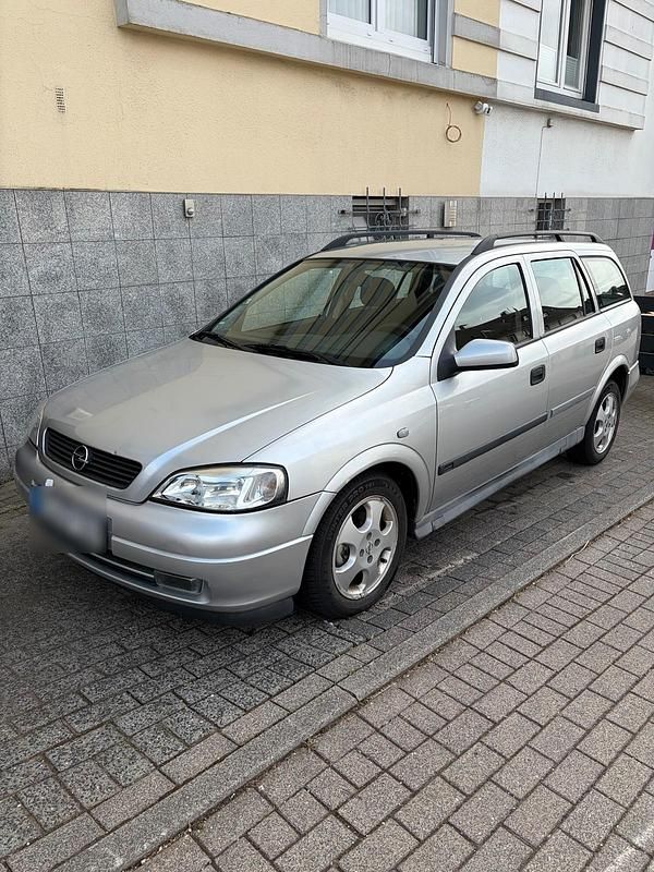 Second-hand Opel Astra 101 CP (74 kW) 2000 Argintiu Break