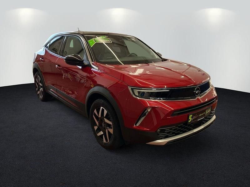 Gebraucht Opel Mokka-e Elegance 100 kW (136 PS) 2022 Power rot/kosmos rot SUV