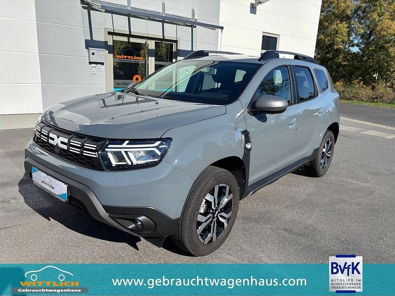 Grau Gebraucht 2024 Dacia Duster Journey SUV | 18.900 € (Superpreis) - Bild 1/4