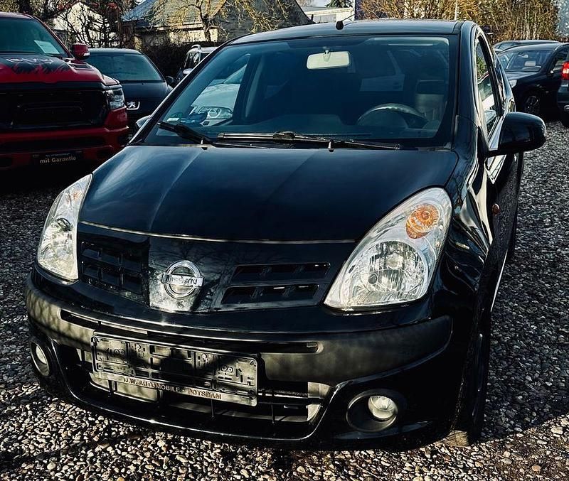Gebraucht Nissan Pixo Acenta 68 PS (50 kW) 2009 Schwarz Kleinwagen