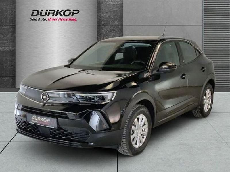 Diamant schwarz/karbon schwarz (metallic) Gebraucht 2021 Opel Mokka-e Edition SUV | 15.850 € (Superpreis) - Bild 1/4