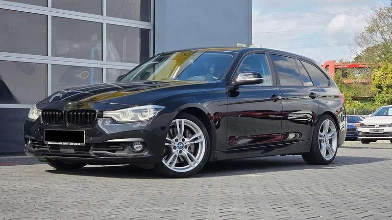 Schwarz ii Gebraucht 2017 BMW 335 Sport Line Kombi | 18.988 € (Superpreis) - Bild 1/4