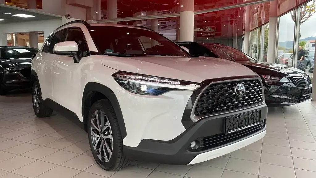 Gebraucht Toyota Corolla Cross Team 152 PS (111 kW) 2025 Platinum white pearl mc. SUV