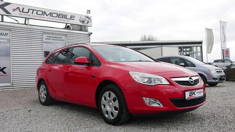 Gebraucht Opel Astra 120 PS (88 kW) 2011 Power rot/traffic red ral3020 Kombi