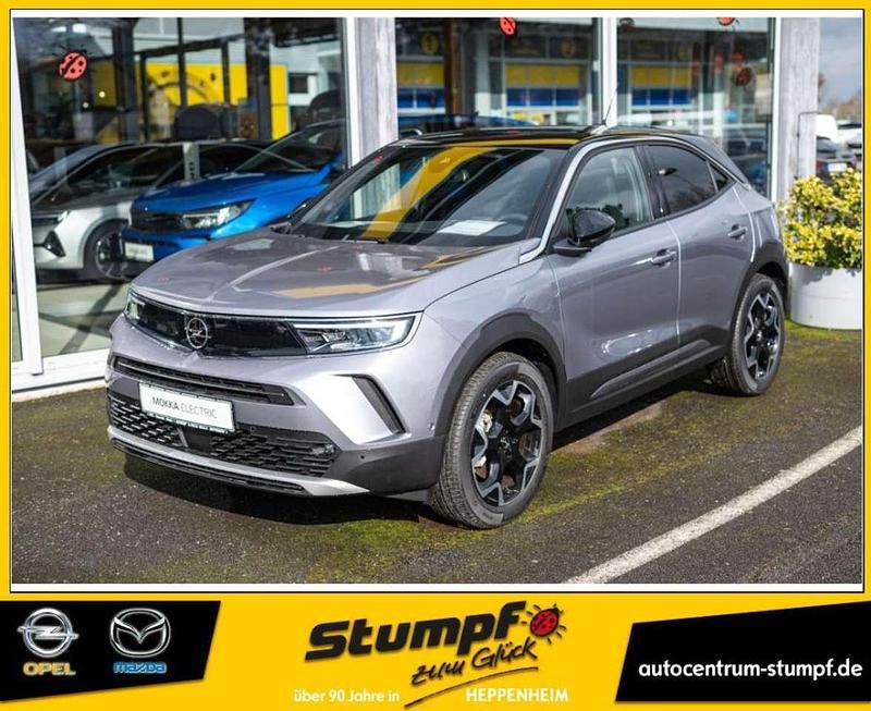 Kontrast grau metallic Gebraucht 2023 Opel Mokka-e Ultimate SUV | 29.990 € - Bild 1/4