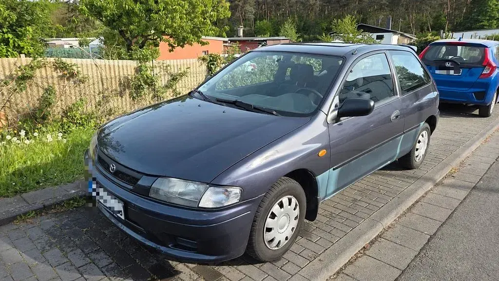 Gebraucht Mazda 323 88 PS (64 kW) 1999 Blau Limousine