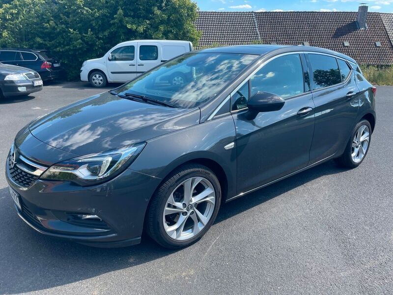 Grau Gebraucht 2016 Opel Astra Innovation Limousine | 13.550 € (Fairer Preis) - Bild 1/4