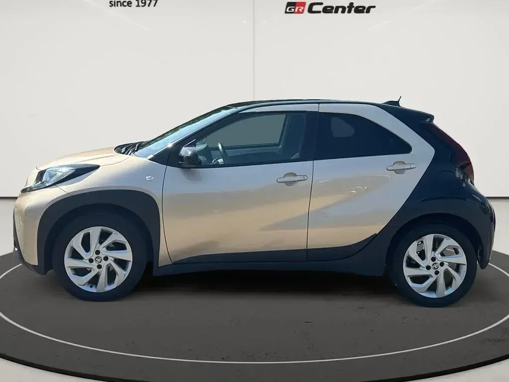 Gebraucht Toyota Aygo X Pulse 72 PS (52 kW) 2022 Ginger beige (4u9)/ black mica SUV