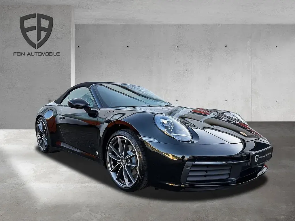 Gebraucht Porsche 911 Carrera Cabriolet 385 PS (283 kW) 2023 Tiefschwarz Cabrio