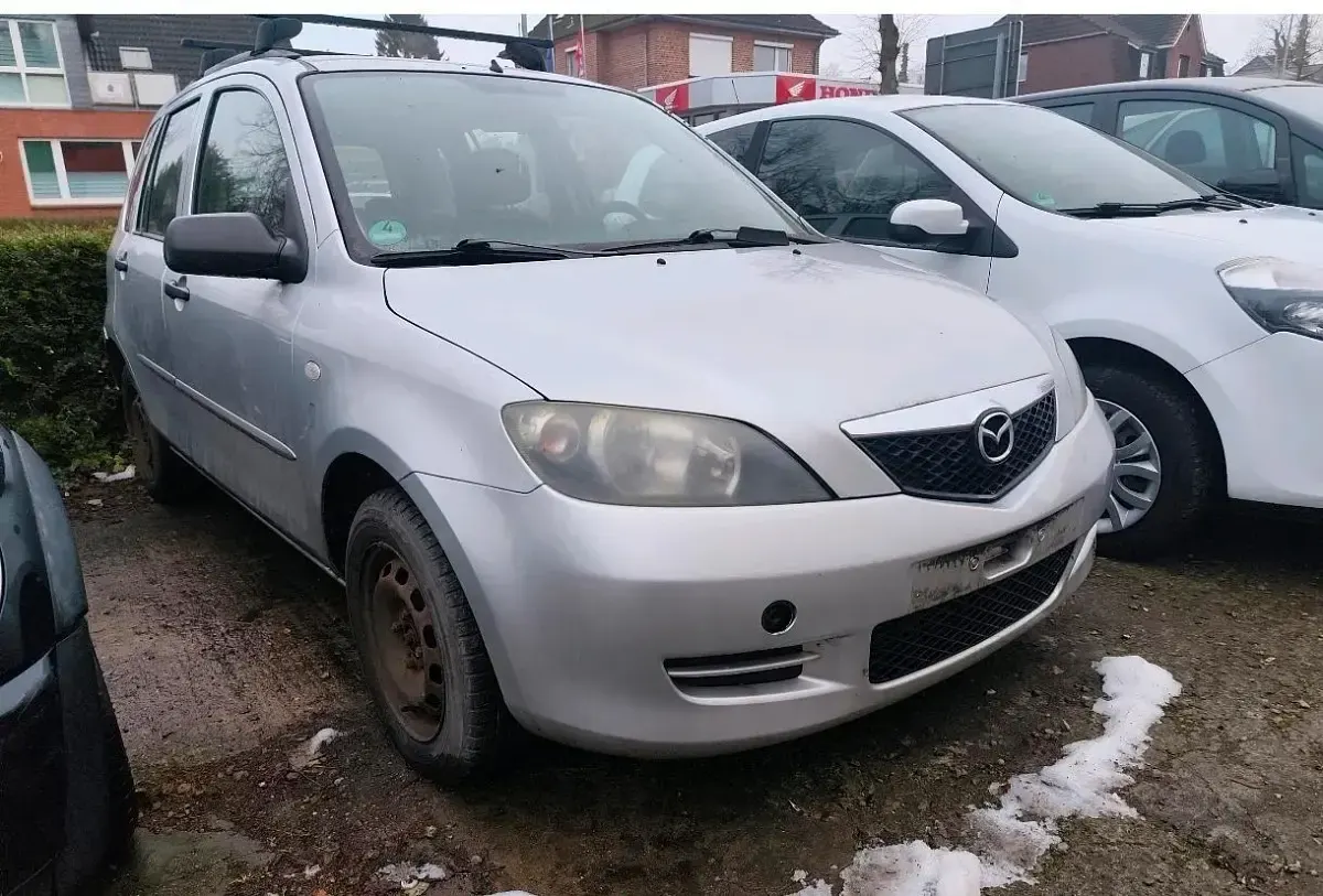 Używany Mazda 3 80 KM (58 kW) 2003 Szary Hatchback