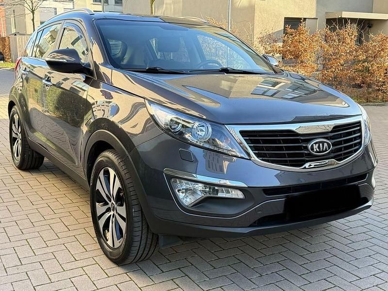 Grau Gebraucht 2011 Kia Sportage Spirit SUV | 8.999 € (Fairer Preis) - Bild 1/4