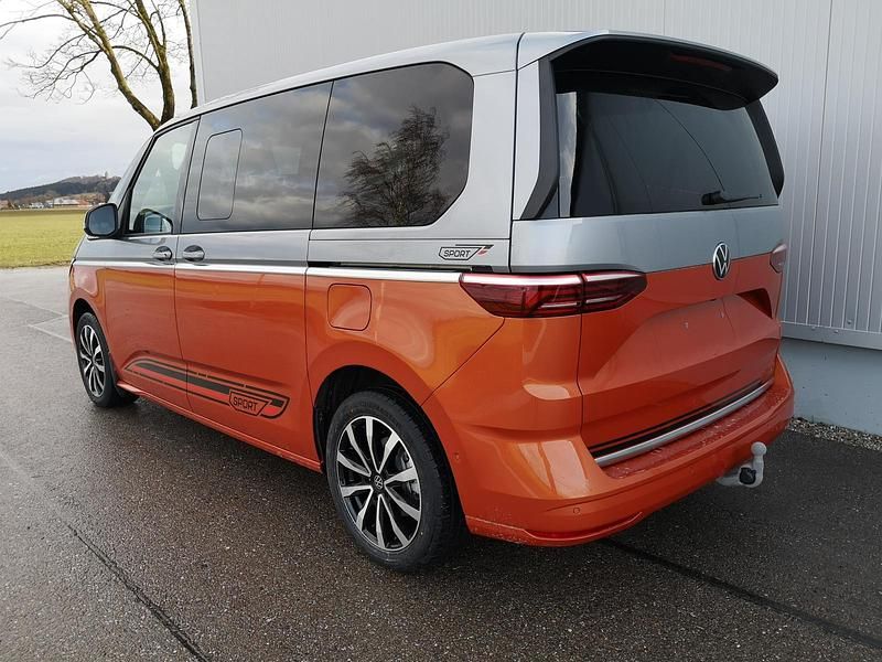 Neu VW Multivan Edition 150 PS (110 kW) 2025 Monosilber metallic / energetic orange metallic Van