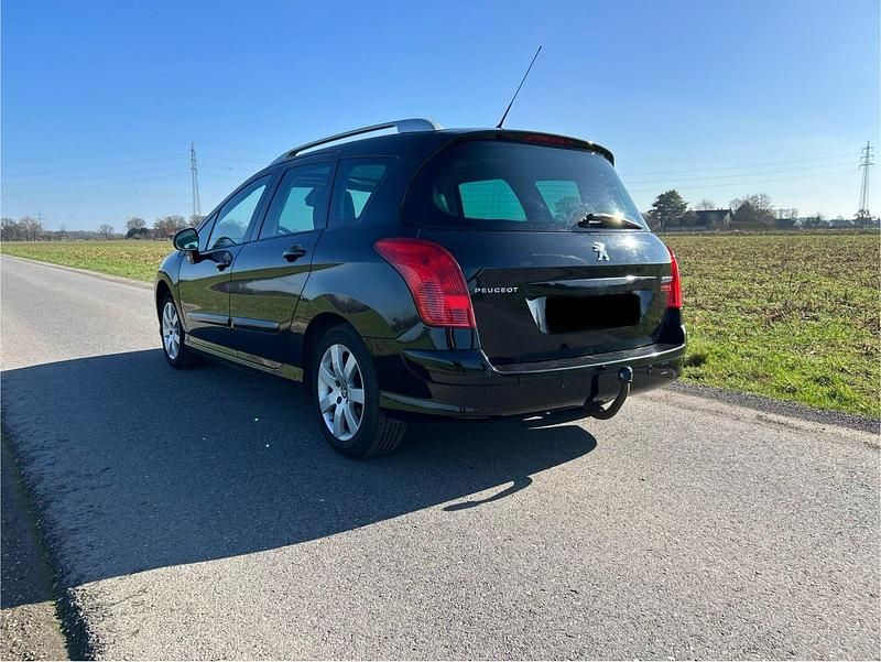 Gebraucht Peugeot 308 SW 115 PS (84 kW) 2012 Schwarz Kombi