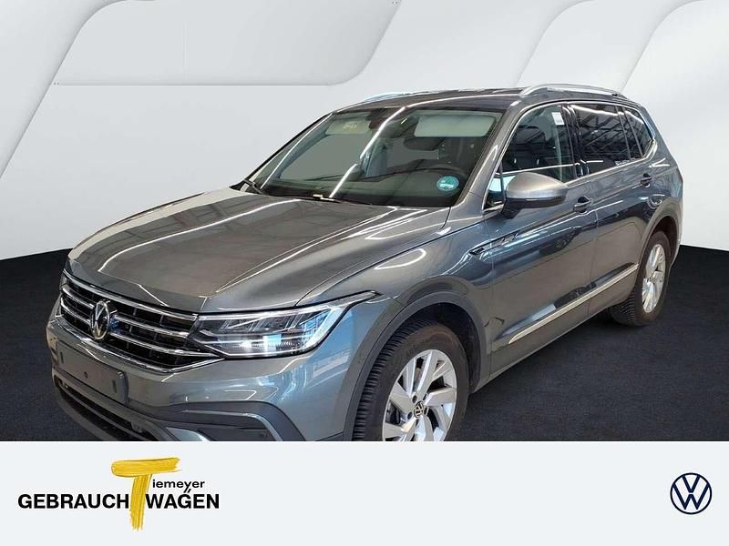 Grau Gebraucht 2024 VW Tiguan Allspace Life SUV | 33.870 € (Superpreis) - Bild 1/4