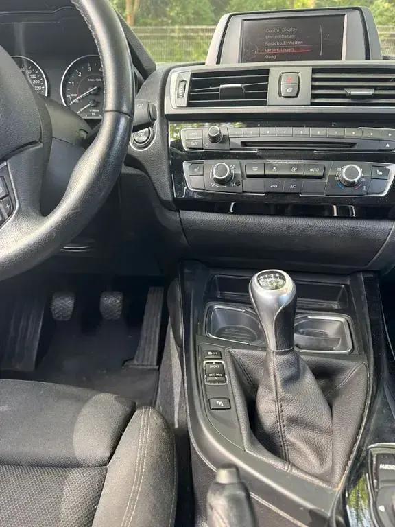 Używany BMW 116 109 KM (80 kW) 2016 Czarny Hatchback