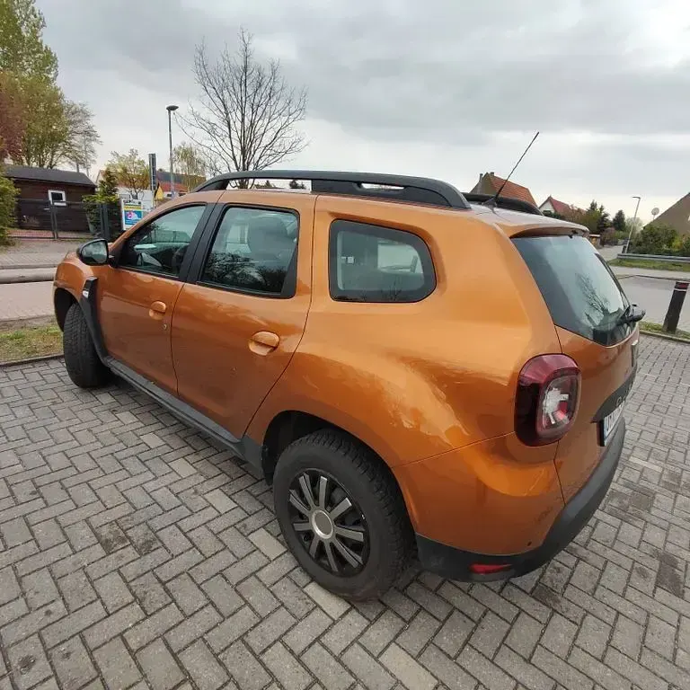 Używany Dacia Duster 101 KM (74 kW) 2020 Pomarańczowy SUV