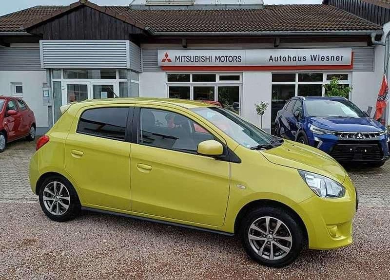 Karambolagelb Gebraucht 2015 Mitsubishi Space Star Classic Collection Plus Limousine | 6.800 € (Fairer Preis) - Bild 1/4
