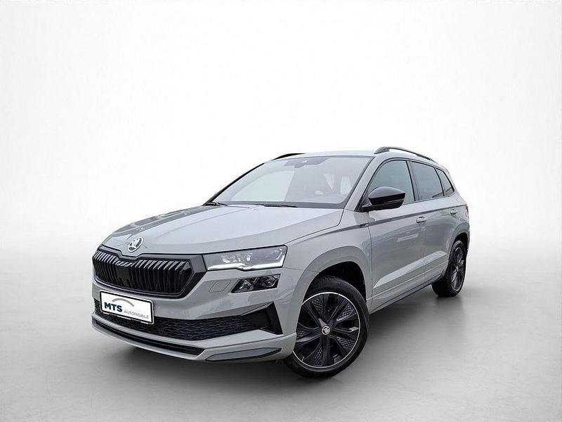 Grau Gebraucht 2022 Skoda Karoq SportLine SUV | 29.150 € (Fairer Preis) - Bild 1/4