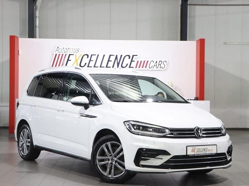 Pure white Gebraucht 2021 VW Touran Highline Van / Kleinbus | 25.991 € (Guter Preis) - Bild 1/4
