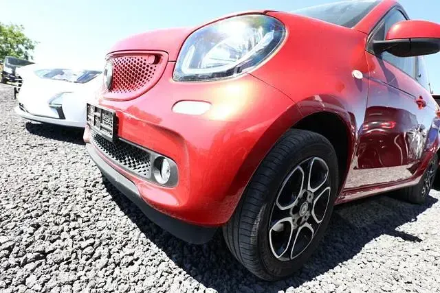Gebraucht Smart ForFour Passion 71 PS (52 kW) 2019 Cadmium red metallic cadmium red metallic Kleinwagen