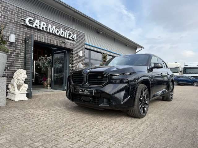 Black saphire metallic Gebraucht 2024 BMW XM Comfort Edition SUV | 125.700 € (Fairer Preis) - Bild 1/4