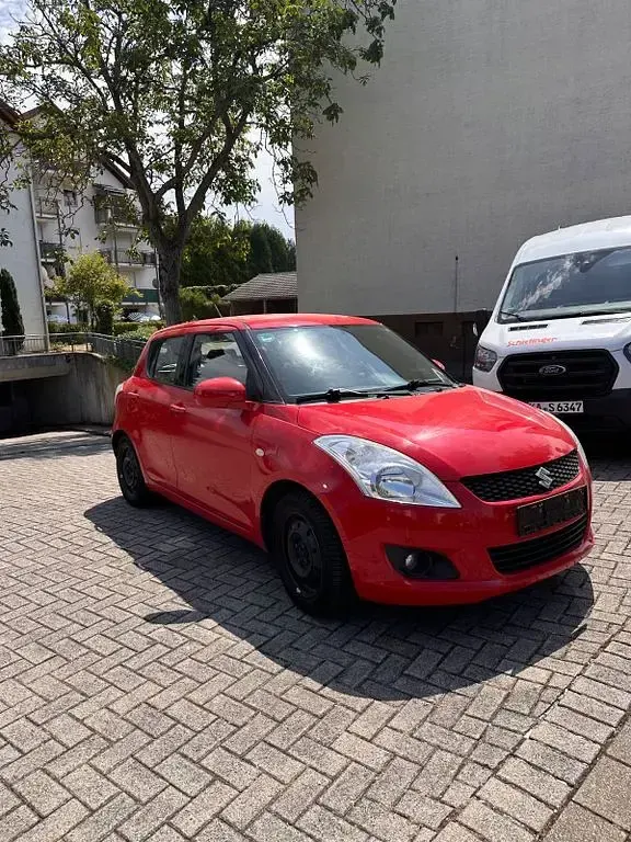 Gebraucht Suzuki Swift 94 PS (69 kW) 2013 Rot Kleinwagen