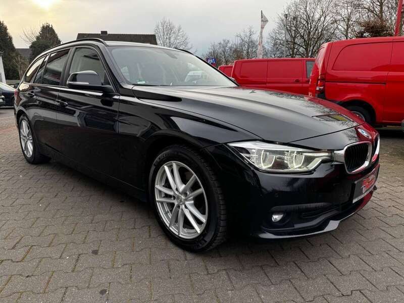 Schwarz Gebraucht 2018 BMW 318 Performance Kombi | 10.990 € - Bild 1/4