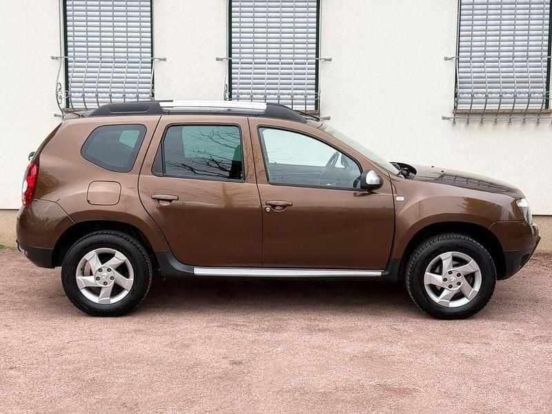 Używany Dacia Duster 105 KM (77 kW) 2012 Brązowy SUV