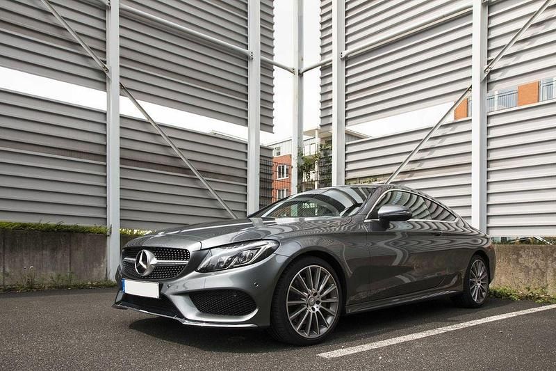 Grau Gebraucht 2016 Mercedes C250 AMG line Coupé | 21.500 € (Fairer Preis) - Bild 1/4