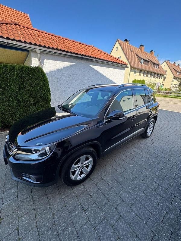 Schwarz Gebraucht 2015 VW Tiguan LOUNGE SUV | 11.499 € (Superpreis) - Bild 1/4