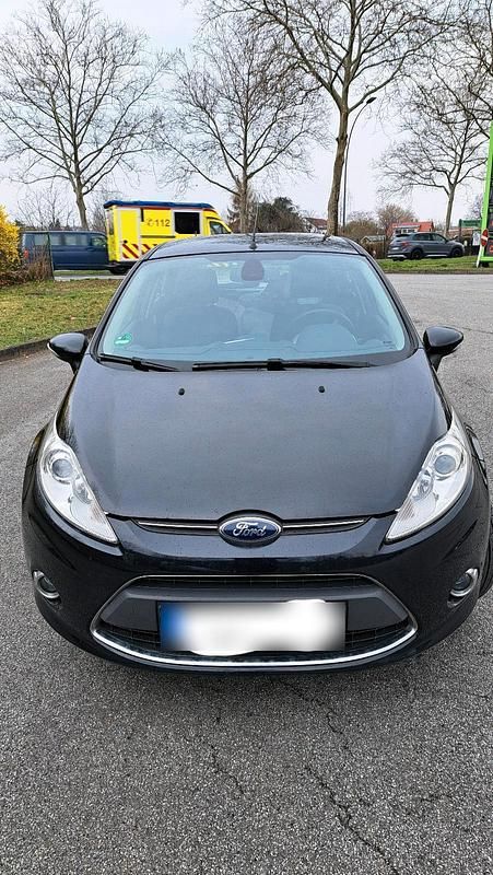 Gebraucht Ford Fiesta Titanium 82 PS (60 kW) 2012 Schwarz Kleinwagen