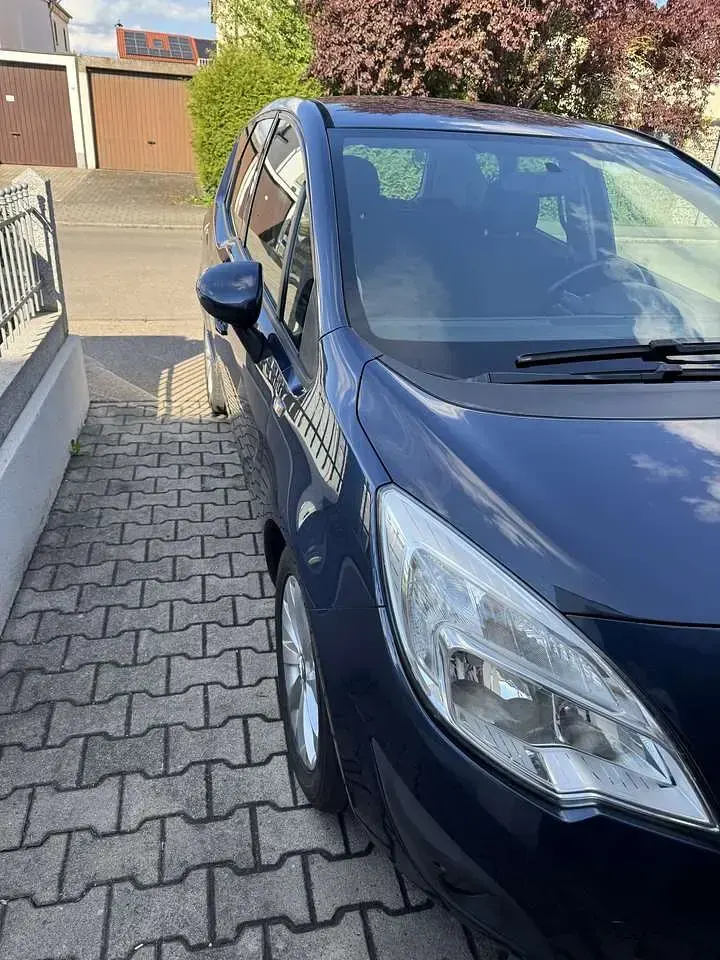 Używany Opel Meriva Selection 95 KM (69 kW) 2011 Niebieski Minivan