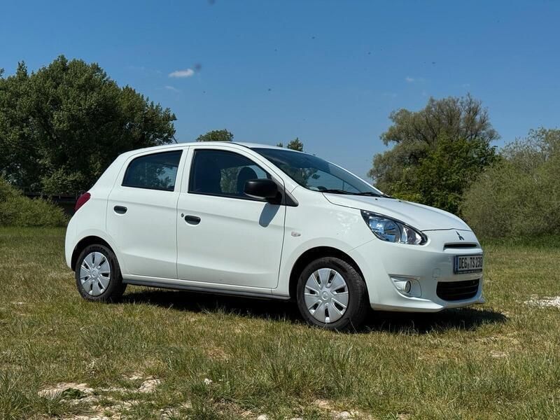 Weiß Gebraucht 2015 Mitsubishi Space Star Top Kleinwagen | 5.250 € (Fairer Preis) - Bild 1/4