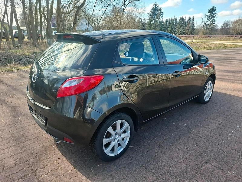 Gebraucht Mazda 2 75 PS (55 kW) 2010 Schwarz Kleinwagen