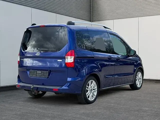 Gebraucht Ford Tourneo 101 PS (74 kW) 2018 (indicblau metallic) Van / Kleinbus