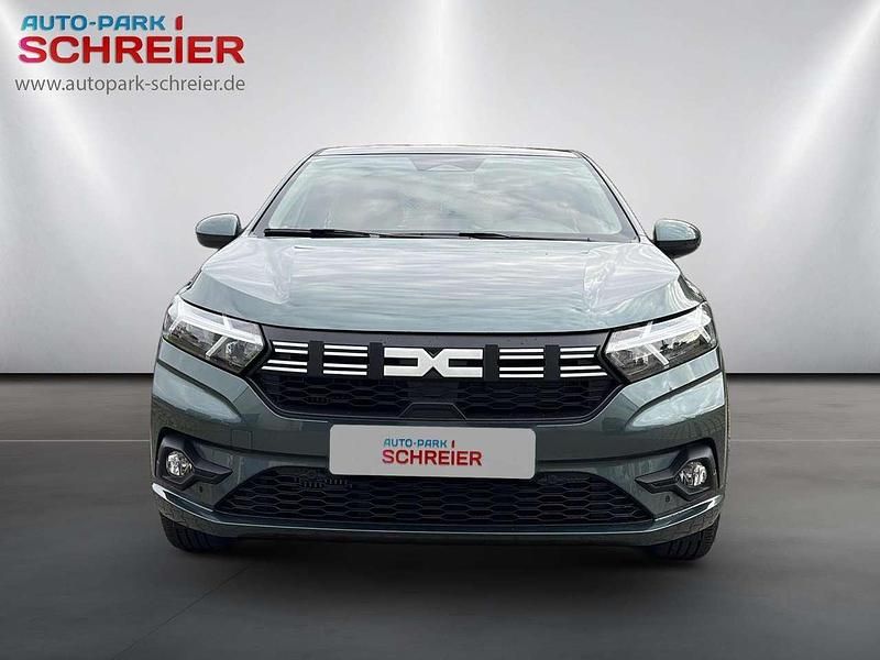 Neu Dacia Sandero Expression 91 PS (66 kW) 2025 Oxidgrün Kleinwagen