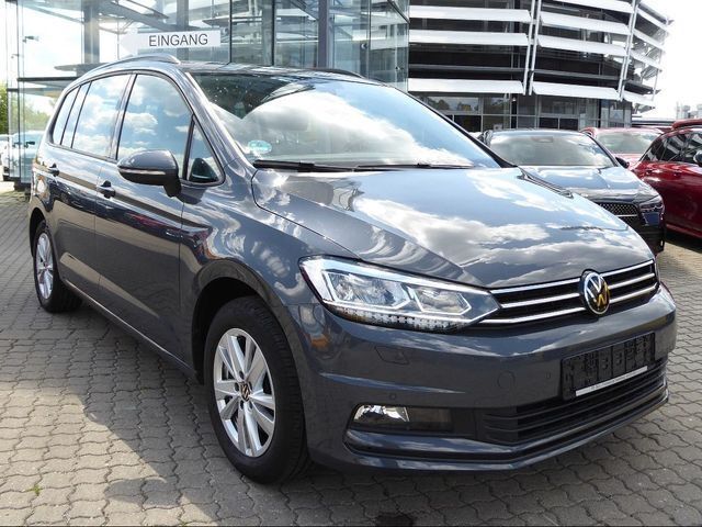 Grau Gebraucht 2023 VW Touran Comfortline Van / Kleinbus | 29.980 € (Fairer Preis) - Bild 1/2
