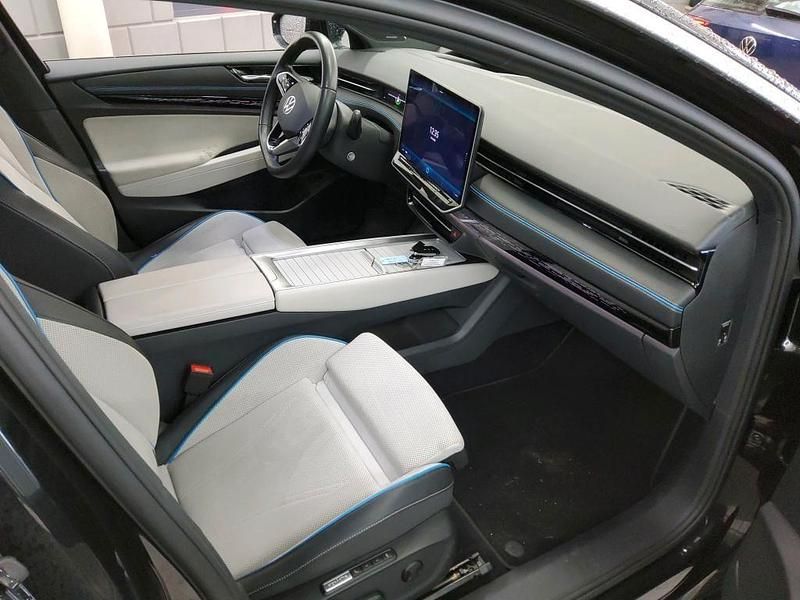 Gebraucht VW ID.7 Pro 210 kW (286 PS) 2023 Grenadillschwarz metallic Kleinwagen