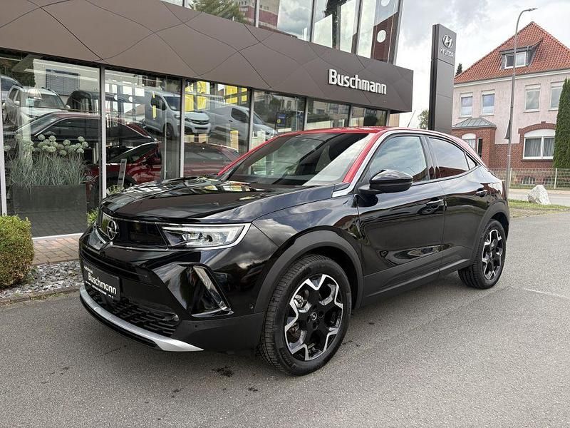 Diamant schwarz metallic Gebraucht 2022 Opel Mokka-e Ultimate SUV | 20.790 € (Teuer) - Bild 1/4