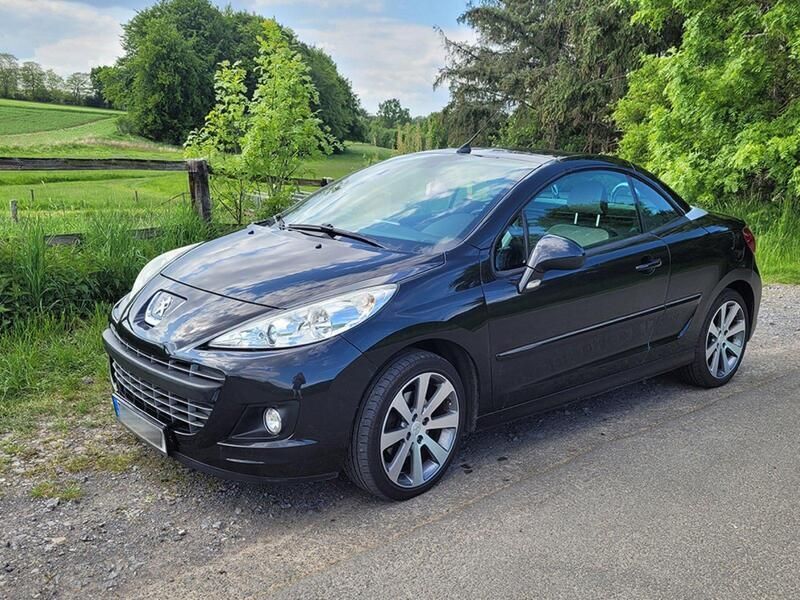 Schwarz Gebraucht 2012 Peugeot 207 CC Roland Garros Cabrio | 4.499 € (Guter Preis) - Bild 1/4
