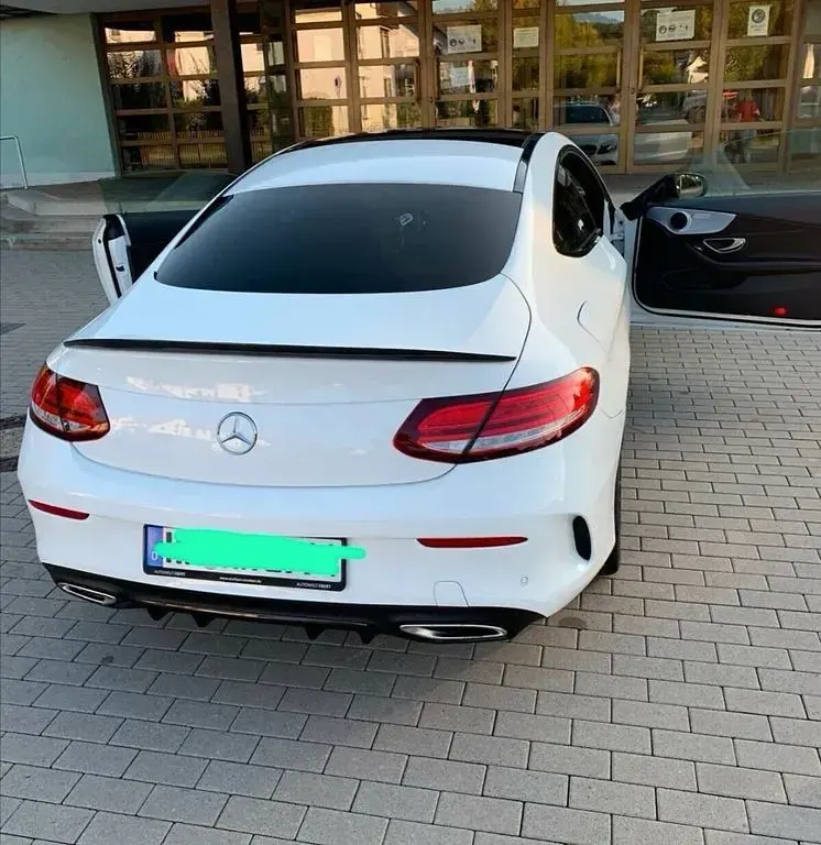 Gebraucht Mercedes C300 AMG 258 PS (189 kW) 2018 Weiß Coupé