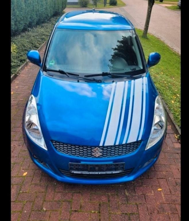 Blau Gebraucht 2012 Suzuki Swift Kleinwagen | 5.790 € (Fairer Preis) - Bild 1/4