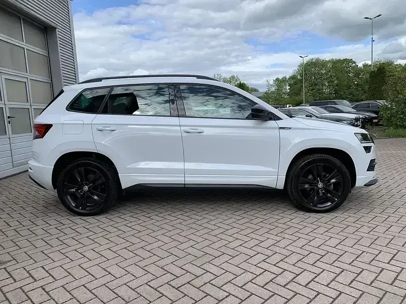 Gebraucht Skoda Karoq SportLine 150 PS (110 kW) 2019 Moonweiss metallic (metallic) SUV