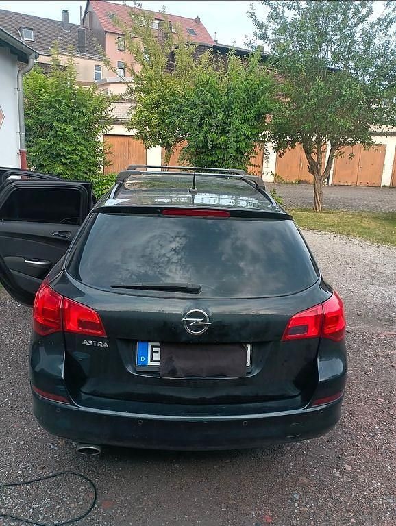 Gebraucht Opel Astra 120 PS (88 kW) 2012 Schwarz Kombi