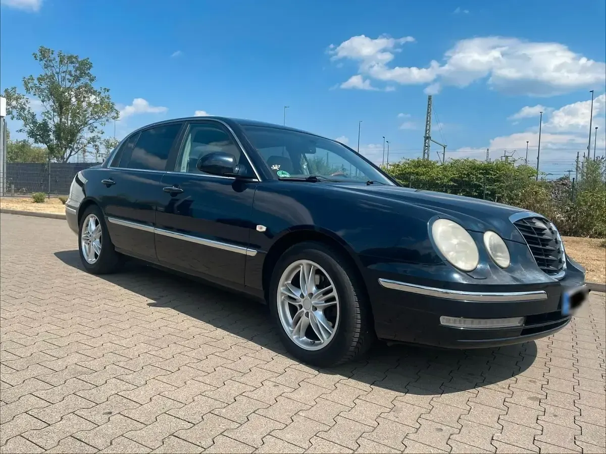 Gebraucht Kia Opirus 203 PS (149 kW) 2006 Blau Limousine