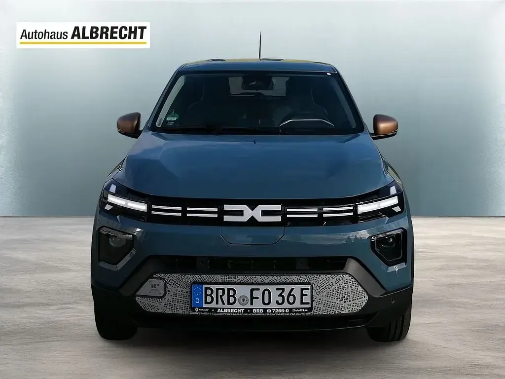 Gebraucht Dacia Spring Extreme 47 kW (65 PS) 2025 Schieferblau Kleinwagen