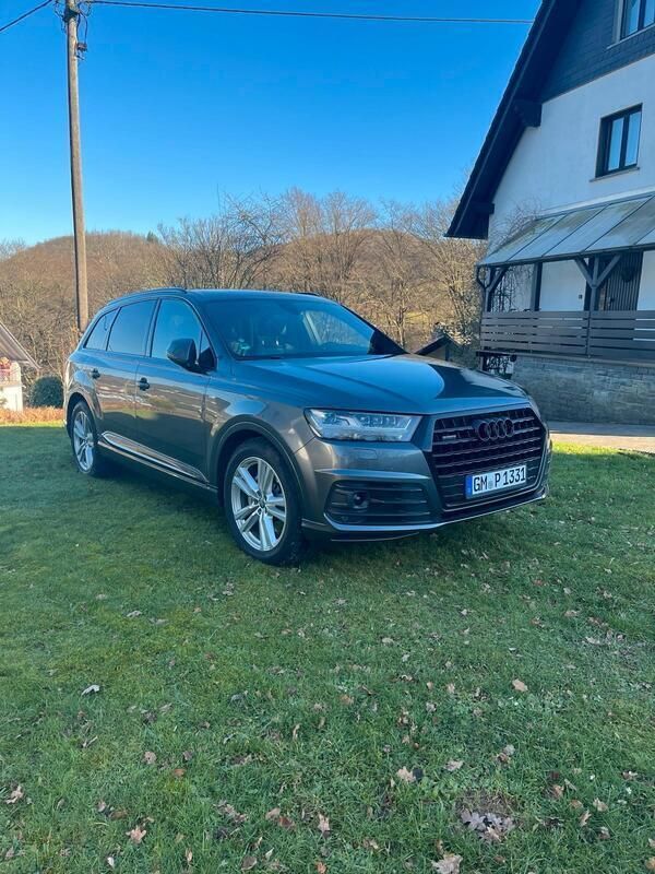 Grau Gebraucht 2016 Audi Q7 S-Line SUV | 36.500 € (Teuer) - Bild 1/4