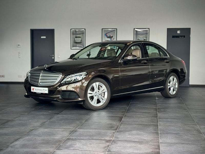 Citrinbraun met. Gebraucht 2015 Mercedes C400 Limousine | 32.480 € (Fairer Preis) - Bild 1/4