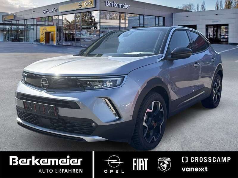 Gebraucht Opel Mokka-e Ultimate 100 kW (136 PS) 2022 Kontrast grau (silber) SUV